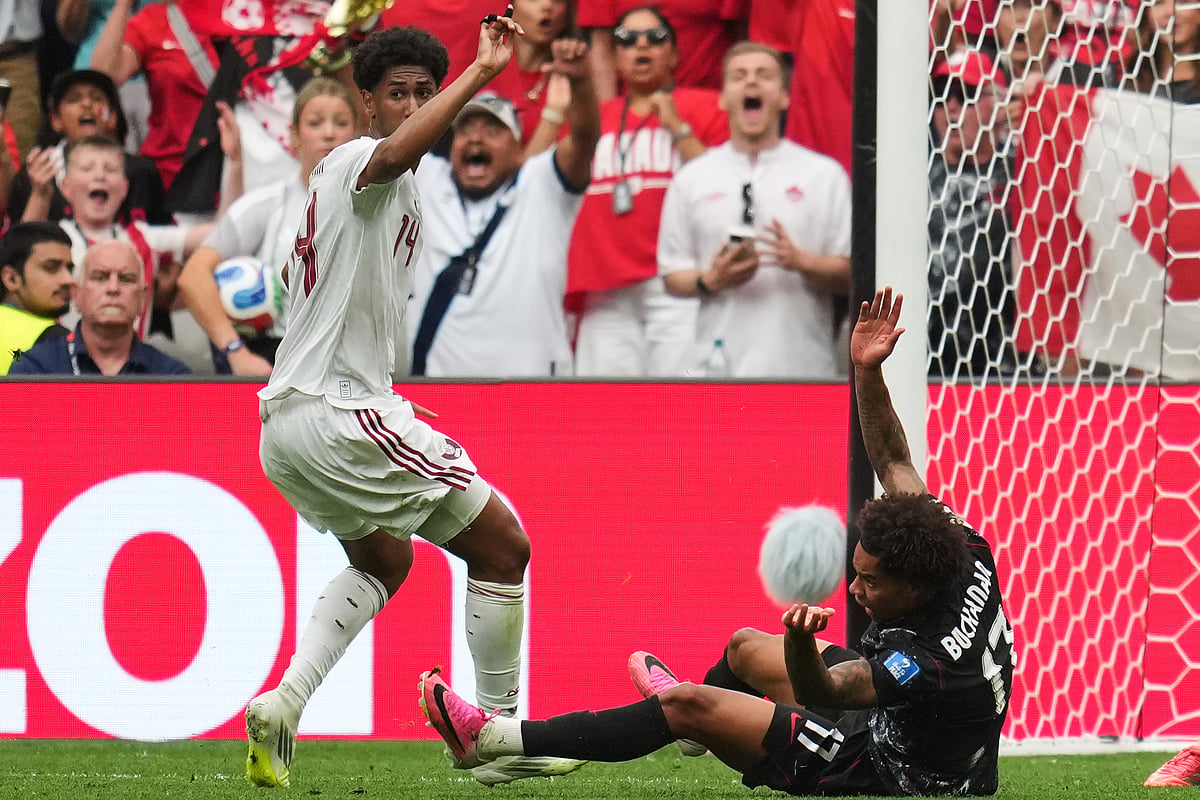 Canada vs Qatar FIFA World Cup 2026 Group B Homam Ahmed fouls Tajon Buchanan RED CARD Ap Photo