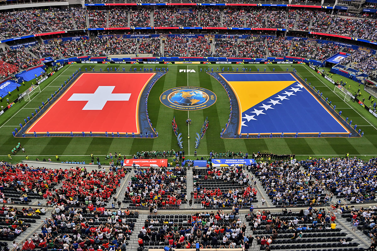 Swiss and Bosnian flags are seen on the pitch before the World Cup Group B soccer match between Switzerland and Bosnia in Inglewood, Calif., near Los Angeles, Thursday, June 18, 2026. - AP Photo/Jayne Kamin-Oncea
