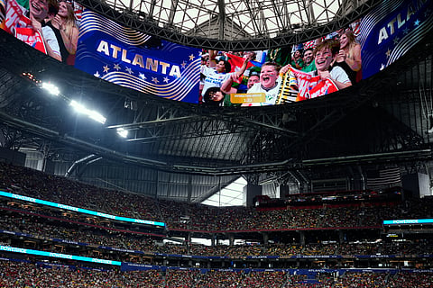 The video screen shows cheering fans during the World Cup Group A soccer match between Czechia and South Africa in Atlanta, Thursday, June 18, 2026.