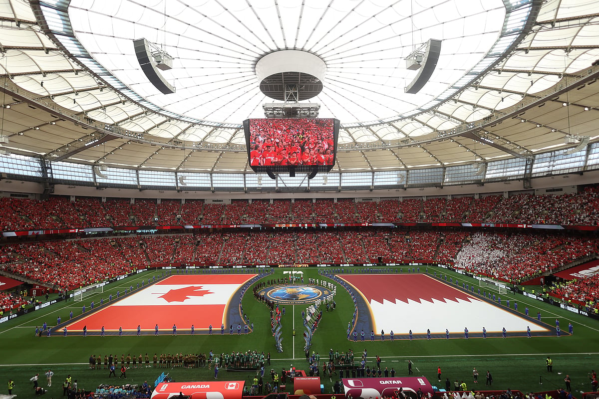 The national flags of Canada and Qatar are displayed during opening ceremonies for the World Cup Group B soccer match between Canada and Qatar in Vancouver, British Columbia, Thursday, June 18, 2026. - AP Photo/Kaleb Tatum