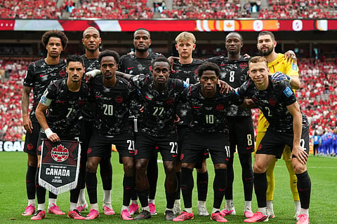 Canada players pose for a team photo before the World Cup Group B soccer match between against Qatar in Vancouver, British Columbia, Thursday, June 18, 2026.