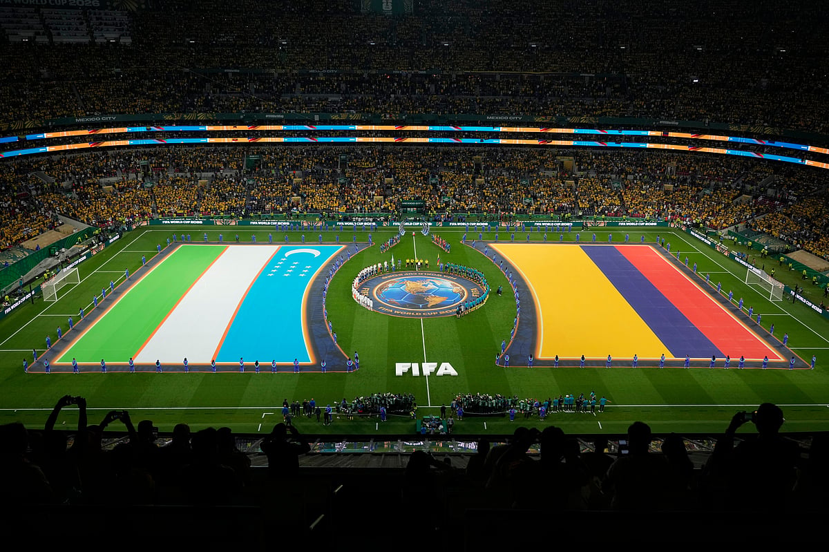 The teams from Uzbekistan and Colombia line up on the field for the national anthems during the teams presentation before theduring the World Cup Group K soccer match between Uzbekistan and Colombia in Mexico City, Wednesday, June 17, 2026 - (AP Photo/Silvia Izquierdo)