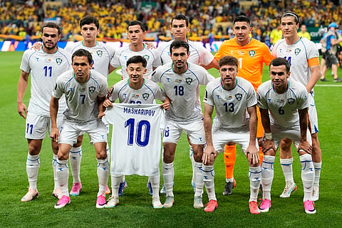 Uzbekistan pose for a team photo ahead of the World Cup Group K soccer match between Uzbekistan and Colombia in Mexico City, Wednesday, June 17, 2026