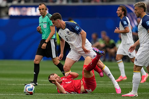 Bosnia's Benjamin Tahirovic (6), battles for the ball with Switzerland's Nico Elvedi (4) . Left, during the World Cup Group B soccer match between Switzerland and Bosnia in Inglewood, Calif, near Los Angeles, Thursday, June 18, 2026.