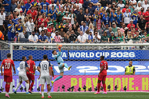 Switzerland goalkeeper Gregor Kobel, top, catches the ball during the World Cup Group B soccer match between Switzerland and Bosnia in Inglewood, Calif., near Los Angeles, Thursday, June 18, 2026.