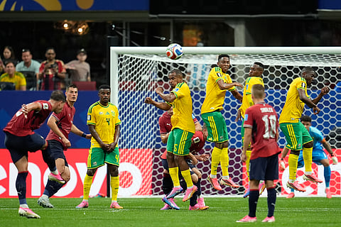 Czechia's Adam Hlozek, left, takes a free kick during the World Cup Group A soccer match between Czechia and South Africa in Atlanta, Thursday, June 18, 2026.