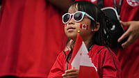 Canada Vs Qatar Live Score, FIFA World Cup 2026: Hosts Reds Set For Clash With Maroons At BC Place Vancouver (AP Photo/Abbie Parr) : A young fan of Canada watches as teams arrive prior to the World Cup Group B soccer match between Canada and Qatar in Vancouver, British Columbia, Thursday, June 18, 2026.