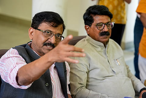 Shiv Sena (UBT) MPs Sanjay Raut, left, and Arvind Sawant during a press conference, in New Delhi.