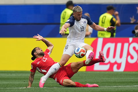 Switzerland's Ricardo Rodriguez, left, tackles Bosnia's Ermedin Demirovic during the World Cup Group B soccer match between Switzerland and Bosnia in Inglewood, Calif., near Los Angeles, Thursday, June 18, 2026.