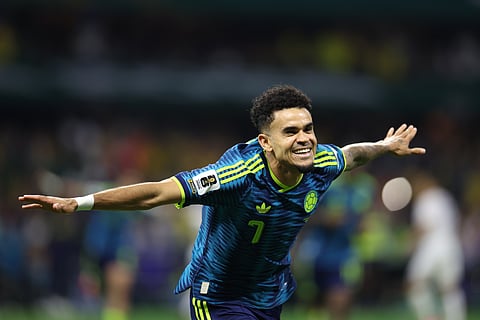 Colombia's Luis Diaz (7) celebrates after scoring his team's second goal during the World Cup Group K soccer match between Uzbekistan and Colombia in Mexico City, Wednesday, June 17, 2026