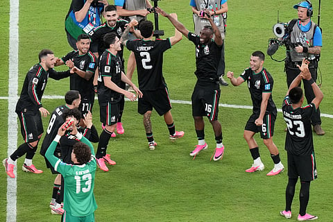 Players from Mexico celebrate after the World Cup Group A soccer match between Mexico and South Korea in Zapopan, near Guadalajara, Mexico, Thursday, June 18, 2026.
