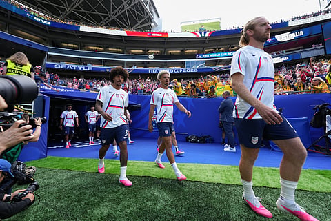 United States players come out for the warm up before the World Cup Group D soccer match between the United States and Australia in Seattle, Friday, June 19, 2026.