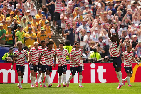 US players celebrate the opening goal of their team during the World Cup Group D soccer match between the United States and Australia in Seattle, Friday, June 19, 2026.