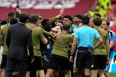 Canada and Qatar players and staff scuffle after the World Cup Group B soccer match between Canada and Qatar in Vancouver, British Columbia, Thursday, June 18, 2026.