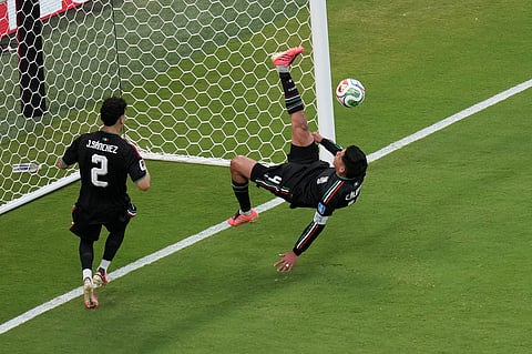 Mexico's Edson Alvarez, right, defends against a kick by South Korea during the World Cup Group A soccer match between Mexico and South Korea in Zapopan, near Guadalajara, Mexico, Thursday, June 18, 2026.