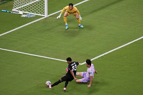 Mexico's Jesus Gallardo (23) kicks the ball against South Korea's Lee Han-beom, bottom right, and goalkeeper Kim Seung-gyu, top, during the World Cup Group A soccer match between Mexico and South Korea in Zapopan, near Guadalajara, Mexico, Thursday, June 18, 2026.