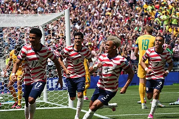 AP Photo/Ted S. Warren : US players celebrate after a goal during the World Cup Group D soccer match between the United States and Australia in Seattle, Friday, June 19, 2026.