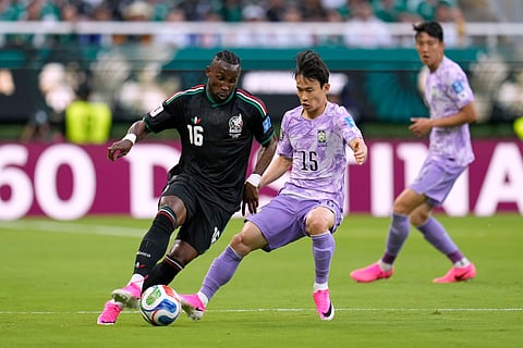 Mexico's Julian Quinones (16), left, vies for the ball with South Korea's Kim Moon-hwan (15) during the World Cup Group A soccer match between Mexico and South Korea in Zapopan, near Guadalajara, Mexico, Thursday, June 18, 2026.