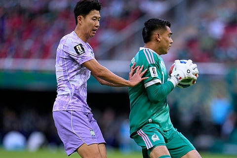 South Korea's Son Heung-min (7), left, and Mexico goalkeeper Raul Rangel (1) during the World Cup Group A soccer match between Mexico and South Korea in Zapopan, near Guadalajara, Mexico, Thursday, June 18, 2026.