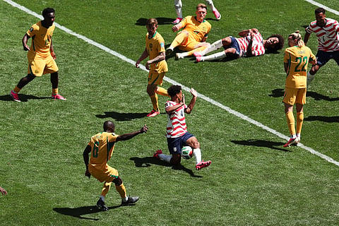United States' Tyler Adams (4) blocks a shot by Australia's Jason Geria (6) during the World Cup Group D soccer match between the United States and Australia in Seattle, Friday, June 19, 2026.