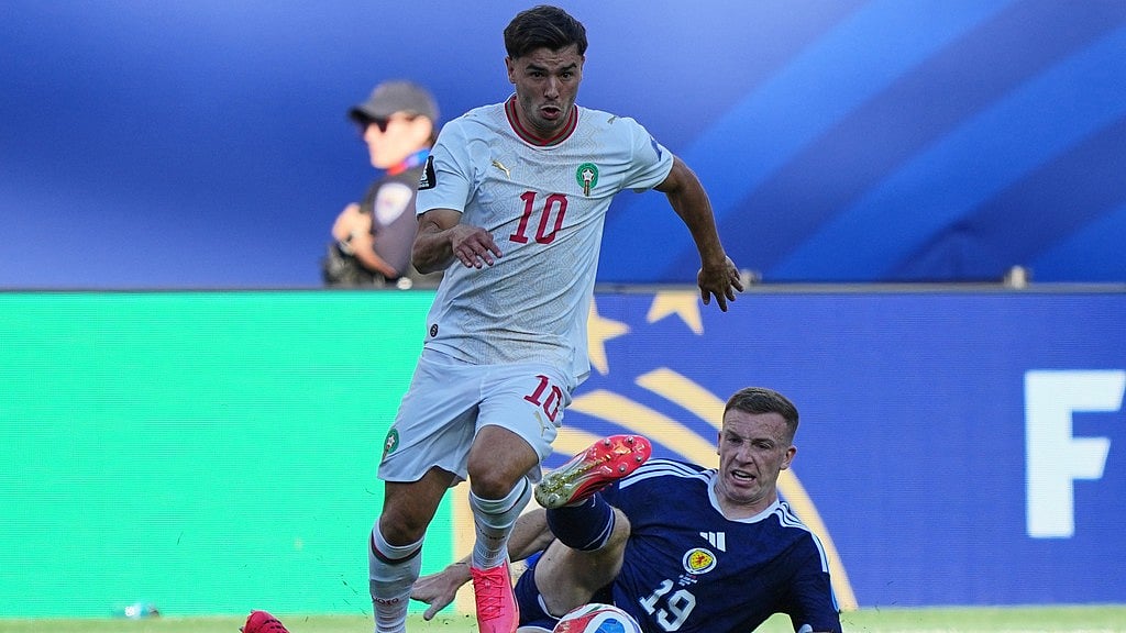 Scotland's Lewis Ferguson, right, challenges Morocco's Brahim Diaz during the World Cup Group C soccer match between Scotland and Morocco in Foxborough. - AP Photo