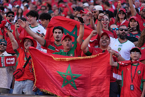 Moroccan fans cheer on their team during the World Cup Group C soccer match between Scotland and Morocco in Foxborough, Mass., near Boston, Friday, June 19, 2026.