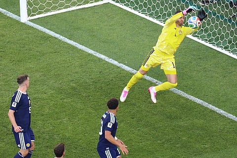 Scotland goalkeeper Angus Gunn (1) blocks a shot at goal during the World Cup Group C soccer match between Scotland and Morocco in Foxborough, Mass., near Boston, Friday, June 19, 2026.