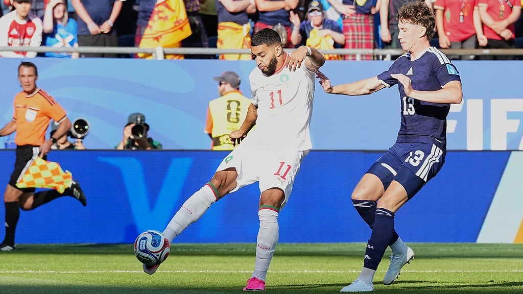 Morocco's Ismael Saibari, bottom left, is congratulated after scoring his side's opening goal during the World Cup Group C soccer match between Scotland and Morocco in Foxborough. - AP Photo