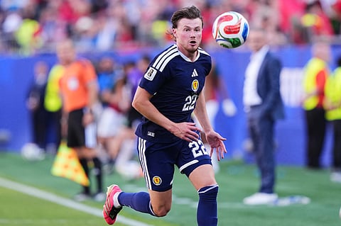 Scotland's Nathan Patterson runs for the ball during the World Cup Group C soccer match between Scotland and Morocco in Foxborough, Mass., near Boston, Friday, June 19, 2026.