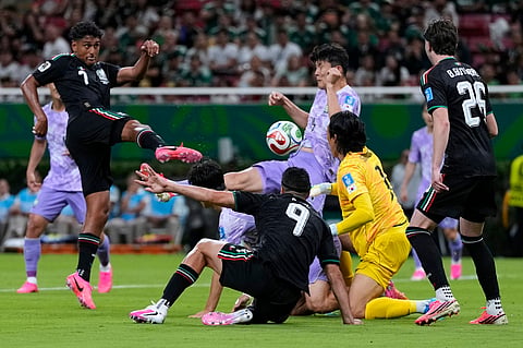 Mexico's Luis Romo (7), left, scores the opening goal during the World Cup Group A soccer match between Mexico and South Korea in Zapopan, near Guadalajara, Mexico, Thursday, June 18, 2026.