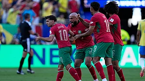 AP Photo/Petr David Josek : Moroccos Brahim Diaz, left, and teammates celebrate after Ismael Saibari scored the opening goal during the World Cup Group C soccer match between Brazil and Morocco in East Rutherford, N.J., near New York, Saturday, June 13, 2026.