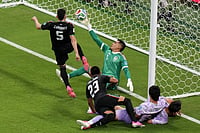 AP Photo/Silvia Izquierdo : Mexico goalkeeper Raul Rangel, middle, reaches to stop the ball during the World Cup Group A soccer match between Mexico and South Korea in Zapopan, near Guadalajara, Mexico, Thursday, June 18, 2026.