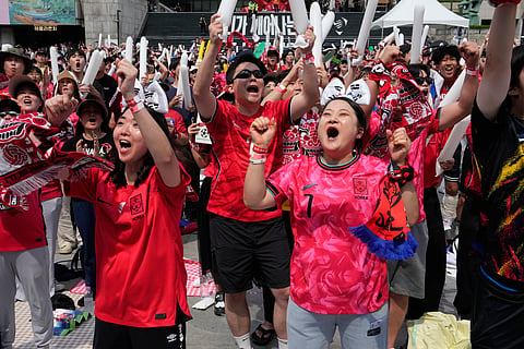 South Korean soccer fans react as they watch a live broadcast of the World Cup Group A soccer match between South Korea and Mexico at a public viewing venue in Seoul, South Korea, Friday, June 19, 2026.