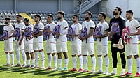Iran To File FIFA Complaint Over World Cup Travel Restrictions In US | Photo: IMAGO/Stringer : The Iranian national team, National team players appear at the ceremony wearing black armbands and carrying girls school backpacks to protest the bombing of Shajareh Tayyebeh girls elementary school in Minab and the US-Israel strikes in Iran ahead of the friendly match between Iran and Nigeria at the Mardan Sports Complex in Antalya, Turkiye