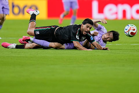 Mexico's Raul Jimenez (9), left, vies for the ball with South Korea's Kim Min-jae (4) during the World Cup Group A soccer match between Mexico and South Korea in Zapopan, near Guadalajara, Mexico, Thursday, June 18, 2026.
