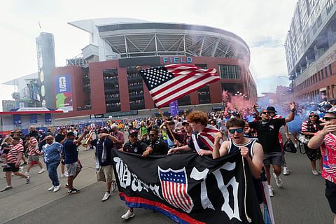 A group of United States fans arrive outside the stadium before the World Cup Group D soccer match between the United States and Australia in Seattle, Friday, June 19, 2026.