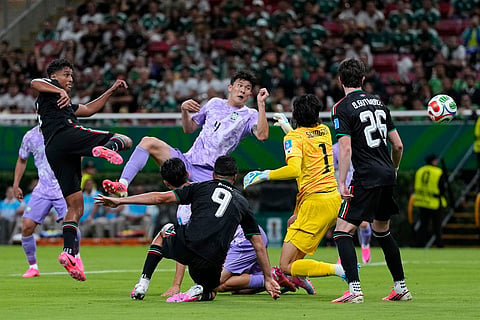 Mexico's Luis Romo (7), left, scores the opening goal during the World Cup Group A soccer match between Mexico and South Korea in Zapopan, near Guadalajara, Mexico, Thursday, June 18, 2026.