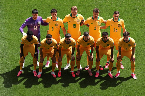 Australia players pose for a group photo before the World Cup Group D soccer match between the United States and Australia in Seattle, Friday, June 19, 2026.