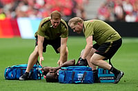 Canada Vs Qatar: Ismael Kone Suffers Horror Leg Injury As Red Card Follows Brutal Challenge Ethan Cairns/The Canadian Press via AP : Medical staff attend to Canada's Ismael Kone (8) after he was injured on a play during the World Cup Group B soccer match between Canada and Qatar in Vancouver, British Columbia, Thursday, June 18, 2026.