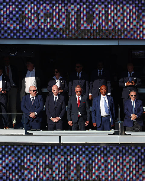 FIFA President Gianni Infantino, second left, stands with officials ahead of the World Cup Group C soccer match between Scotland and Morocco in Foxborough, Mass., near Boston, Friday, June 19, 2026.