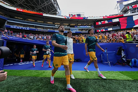 
Australian players come out for the warm up before the World Cup Group D soccer match between the United States and Australia in Seattle, Friday, June 19, 2026.