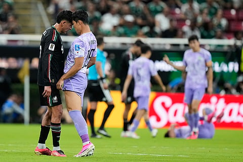 Mexico's Edson Alvarez (4) and South Korea's Oh Hyeon-gyu (18) come together during the World Cup Group A soccer match between Mexico and South Korea in Zapopan, near Guadalajara, Mexico, Thursday, June 18, 2026.