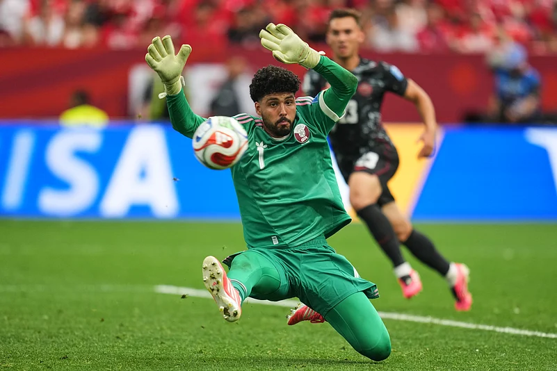 Canada vs Qatar FIFA World Cup 2026 Group B Mahmoud Abunada beaten by Jonathan David AP Photo