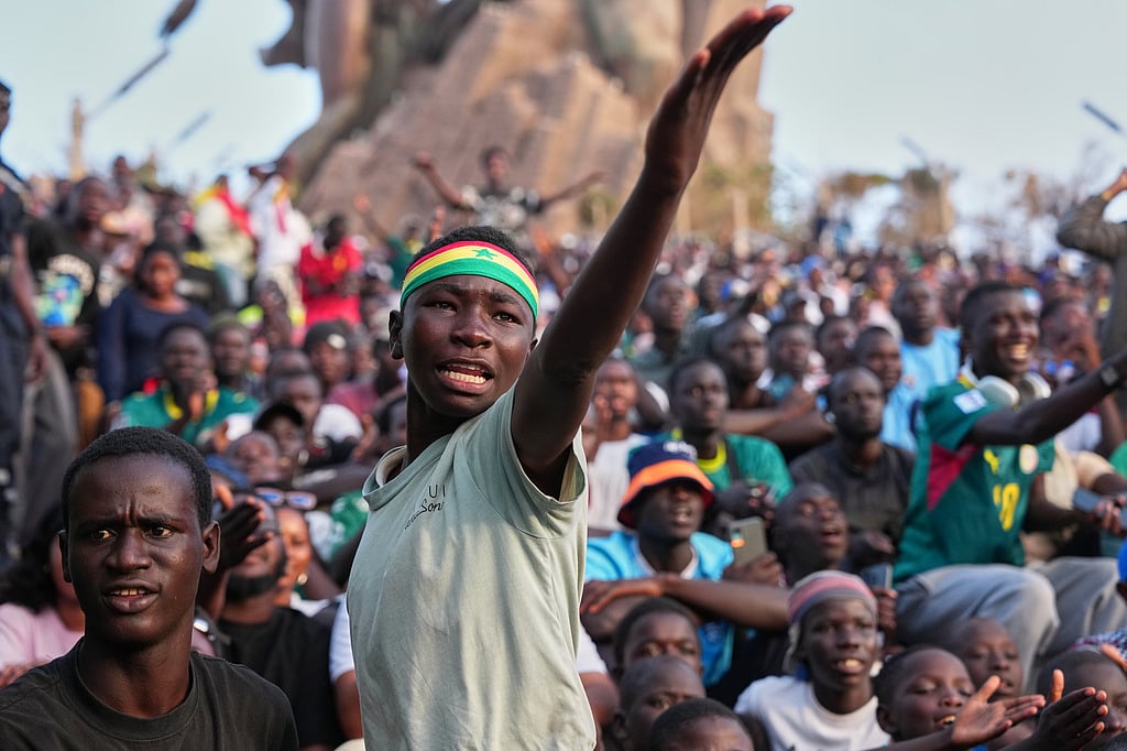A Senegalese fan reacts as he watches a broadcast of the World Cup Group I soccer match between Senegal and France in Dakar, Senegal, Tuesday, June 16, 2026. - AP Photo/Misper Apawu