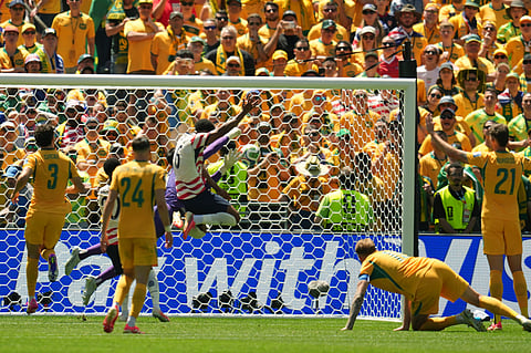 United States' Alex Freeman (16) scores his side's second goal during the World Cup Group D soccer match between the United States and Australia in Seattle, Friday, June 19, 2026.