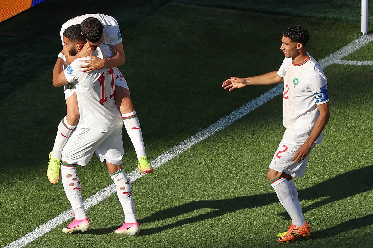 Teammates congratulate Morocco's Ismael Saibari (11) after scoring his team's first goal during the World Cup Group C soccer match between Scotland and Morocco in Foxborough, Mass., near Boston, Friday, June 19, 2026. - AP Photo/Mark Stockwell