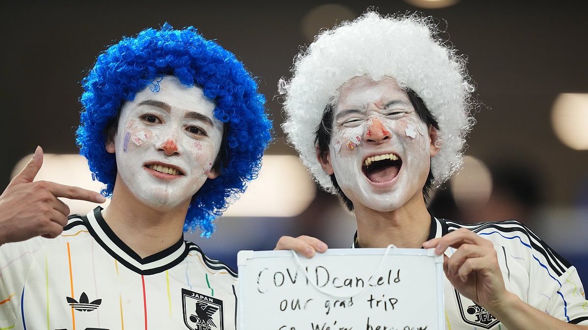Fans of Japan pose for a photo during a World Cup Group F soccer match between the Netherlands and Japan in Arlington, Texas, near Dallas, Sunday, June 14, 2026. - AP Photo/Julio Cortez