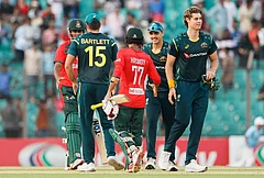 Bangladesh's captain Towhid Hridoy, center, shakes hands with Australian players after Australia won the second T20 international cricket match against Bangladesh, in Chattogram, Bangladesh. - | Photo: AP/Mosaraf Hossain
