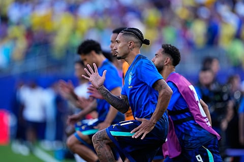 Brazil's Raphinha (11) warms up before the World Cup Group C soccer match between Brazil and Haiti in Philadelphia, Friday, June 19, 2026.