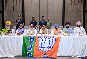 | Photo: @BJP4India/X via PTI : BJP National President Nitin Nabin, centre, with Punjab party president Kewal Singh Dhillon, and others, during the party's State Core Committee meeting, in Amritsar, Punjab.